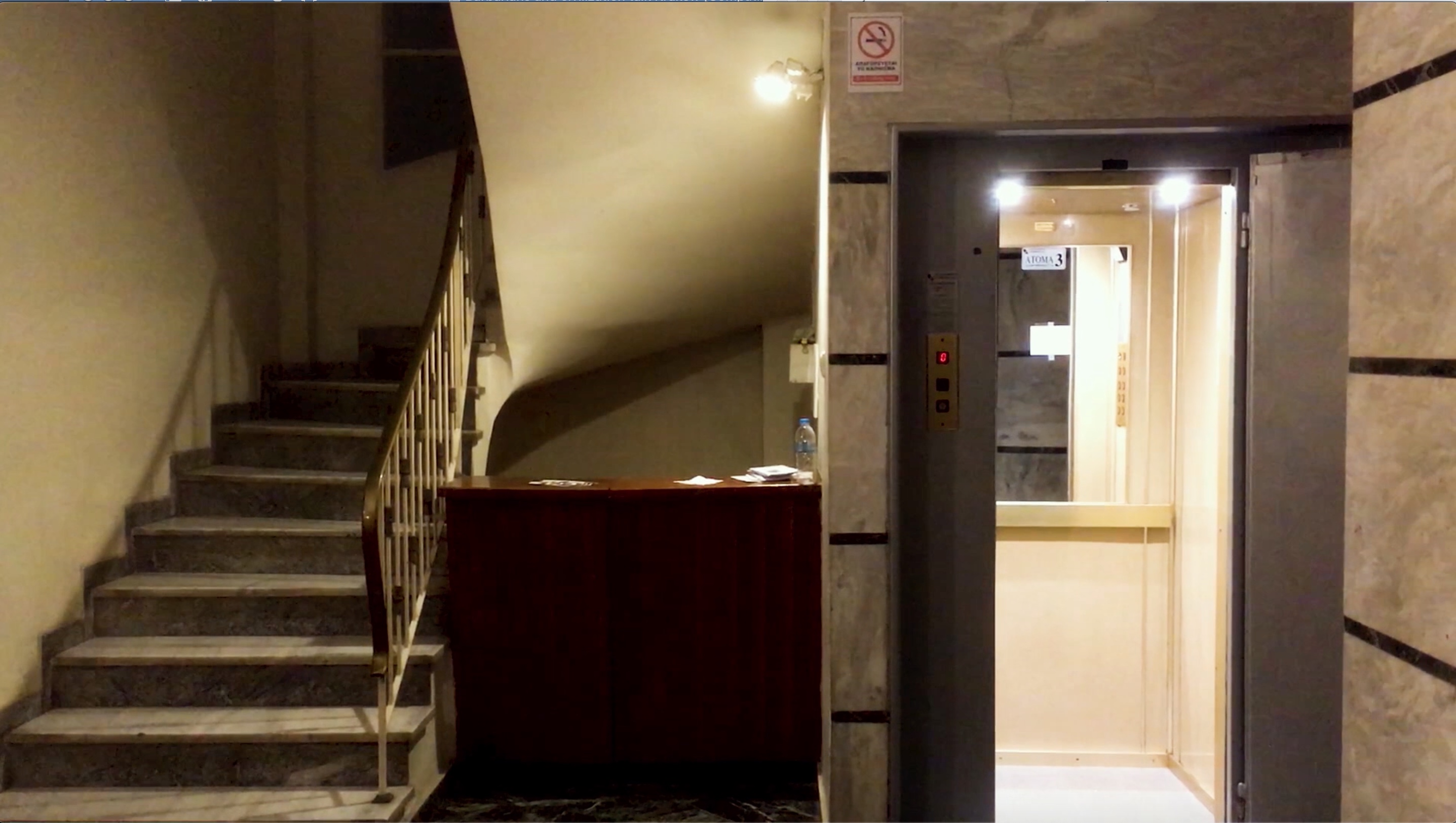 Figure 3: The elevator and the stairs: still from Elina Psykou’s Neighborhood Greece.